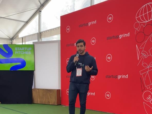 Speaking on stage at Startup Grind Global